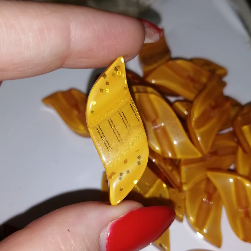 دکمه لباس طرح شیشه ای رنگ نارنجی در بسته 11 عددی