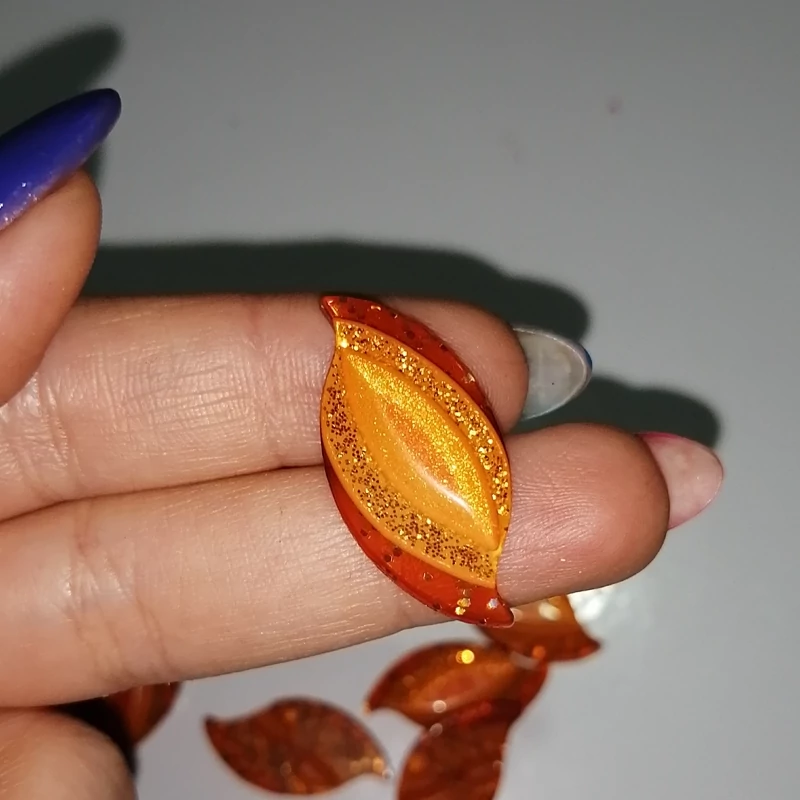 دکمه لباس شیشه ای رنگ نارنجی بسته 12 عددی